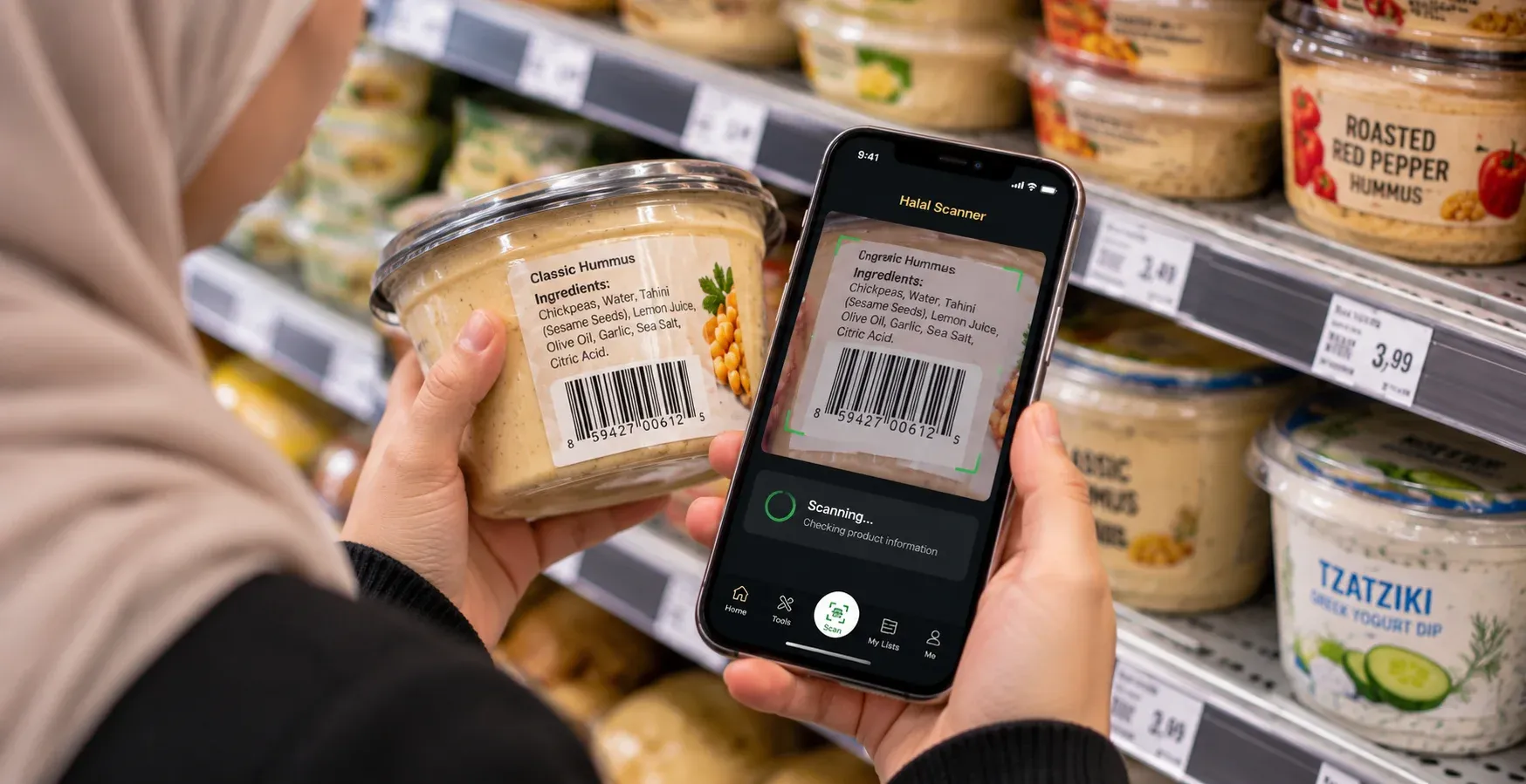 Muslim shopper scanning a barcode on a packaged food item in the grocery store